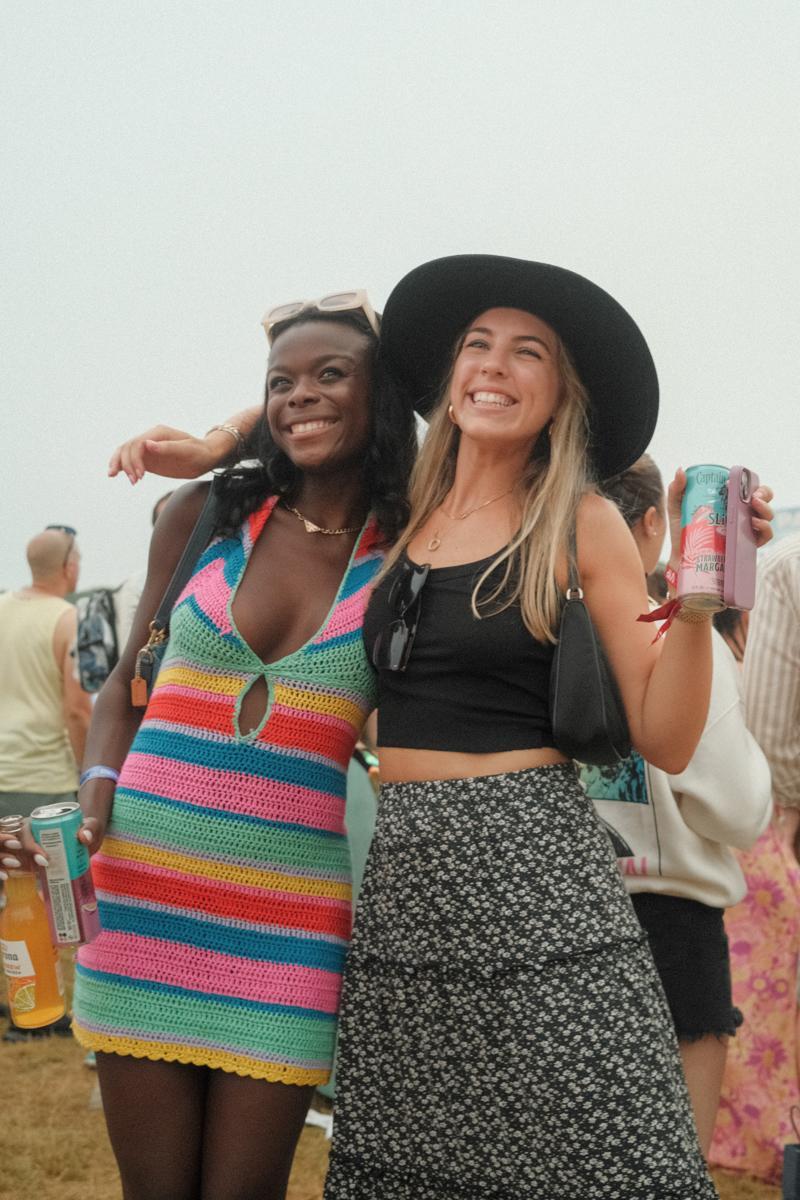 Two fashionable girls at the Palm Tree Festival in Southampton in the Hamptons